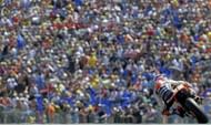 Casey Stoner, in action in 2011, is being treated for suspected torn right ankle ligaments